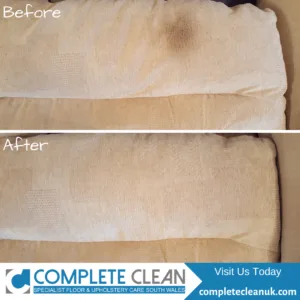 Before and after of a sofa cushion with an oil, head grease patch that gets removed by cleaning