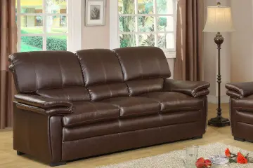 A brown 3 seater leather sofa.